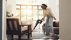 Spring cleaning, chores and woman with vacuum, home and removal of dust, hygiene or germ prevention. House, cleanliness and black person with equipment for rug maintenance, routine and housework