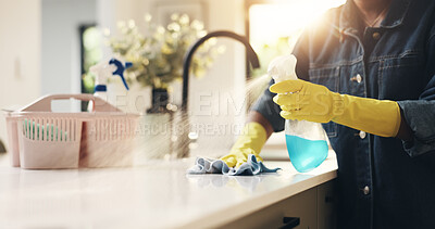 Buy stock photo Hands, person and spray for cleaning at house with detergent, sanitizing counter and remover dirt. Woman, bottle and wipe table for housekeeping chores, prevent bacteria and liquid for hygiene safety