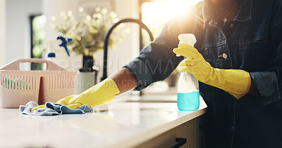 Buy stock photo Hands, person and bottle for cleaning at house with detergent, sanitizing counter and remover dirt. Woman, spray and wipe table for housekeeping chores, prevent bacteria and liquid for hygiene safety