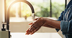Person, water and washing hands with tap in kitchen for hygiene, disinfection or cleaning. Closeup, homeowner and rinse in sink with faucet for cleanliness, dirt or bacteria and germ removal in house
