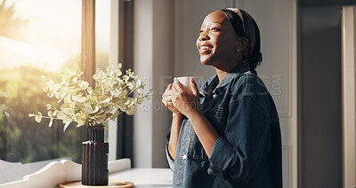 Buy stock photo Happy, black woman or thinking with coffee in home for morning, start or daydreaming. Female person, mindfulness or smile with flare, mug or window reflection for beverage, drink or caffeine in house