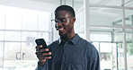 Smile, black man and reading with phone in office for research, proofreading and review article. Happy, male journalist or mobile for chat, contact editor and source check of publication notification