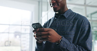 Buy stock photo Hands, black man and reading with phone in office for research, proofreading and review article. Happy, male journalist or mobile for chat, contact editor and source check of publication notification