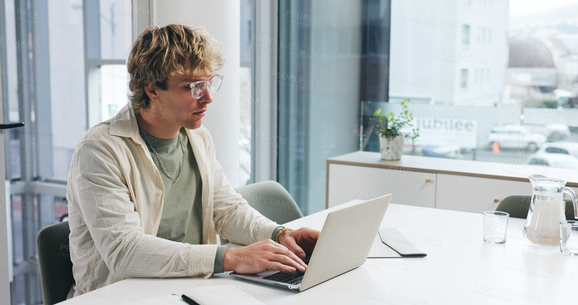 Buy stock photo Typing, glasses and laptop with business man in office for article source, publisher schedule or research. Journalist report, draft editing and planning with person in media agency for magazine