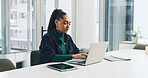 Woman, laptop and typing at startup with thinking, review and reading report at media company. Person, writer and computer with insight, research and editing process with smile at creative agency
