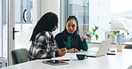 Laptop, discussion and business women in office planning for finance report in collaboration. Computer, paperwork and financial advisors working on investment proposal with meeting in workplace.