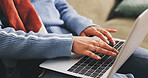 Hands, laptop and typing with person in living room of home for browsing internet or research. Computer, keyboard and networking with user in apartment on weekend to relax for break or me time