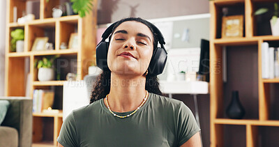 Buy stock photo Zen, smile and headphones with woman in home for streaming service, wellness podcast and mindset. Relax audio, meditation guide and peace sound with person in living room of apartment for music