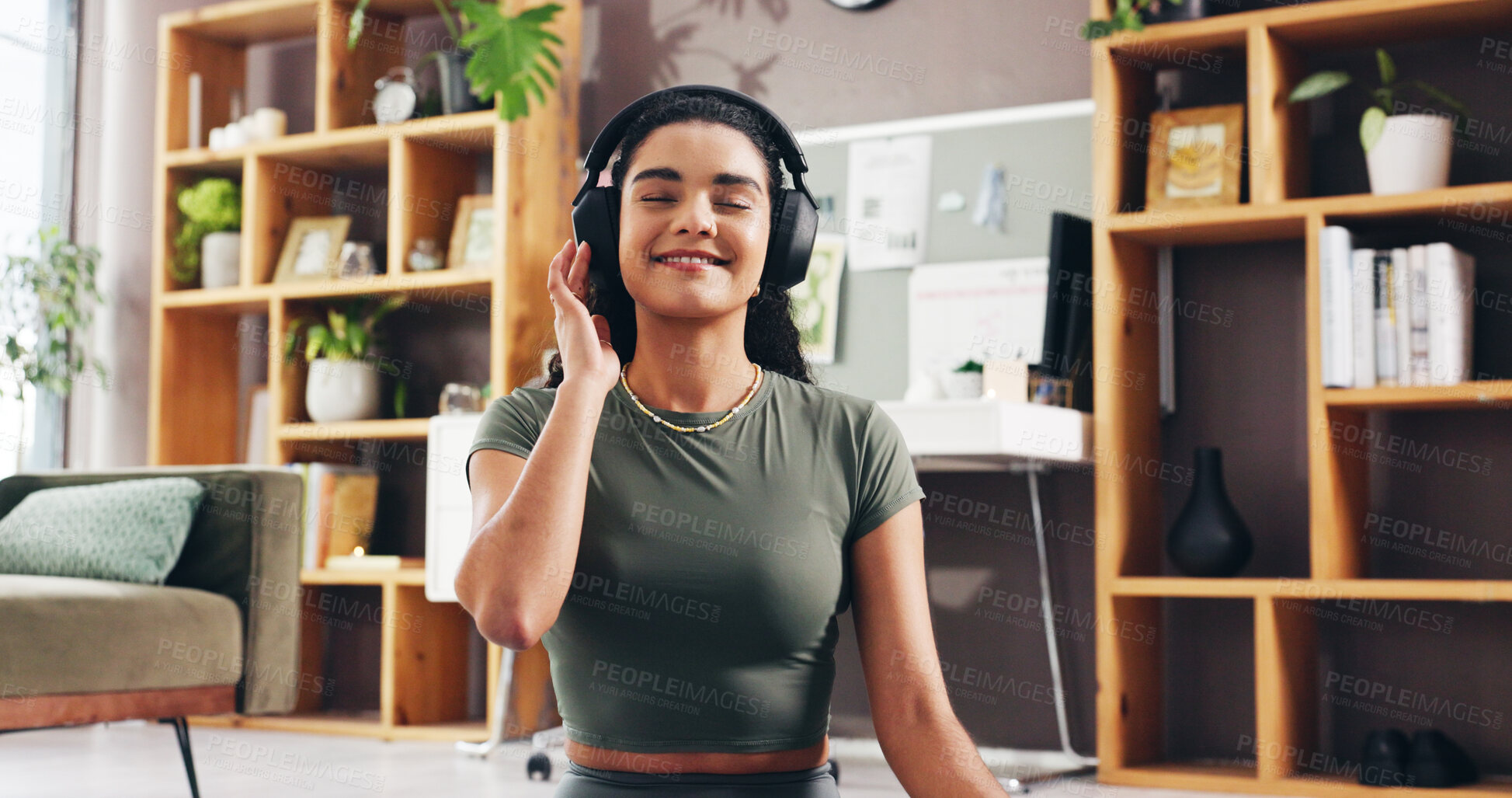 Buy stock photo Relax, smile and headphones with woman in home for streaming service, wellness podcast and mindset. Zen audio, meditation guide and peace sound with person in living room of apartment for music