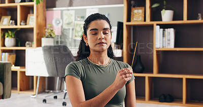 Buy stock photo Meditation, woman and incense smoke for yoga, mindfulness and inner peace in home. Aroma stick, burning and zen with person for aromatherapy, energy cleansing and balance with atmosphere for relax
