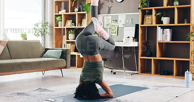 Buy stock photo Woman, back or yoga with mat in home for balance, upside down or health and wellness. Female person, yogi or fitness with headstand pose on floor for pilates, stretching or physical exercise in house