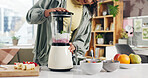 Hands, blender and fruit for wellness in kitchen for gut health, detox and supplements at apartment. Person, machine and organic ingredients for vegan drink, diet or nutrition in morning at house