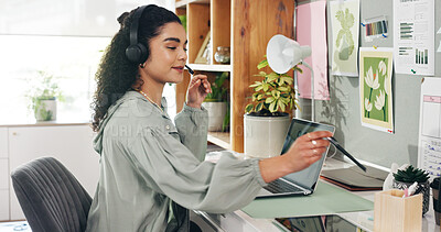 Buy stock photo Woman, headphones and laptop with video call, remote work and online meeting for graphs. Apartment, person and freelancer with computer, virtual communication or conversation for project feedback