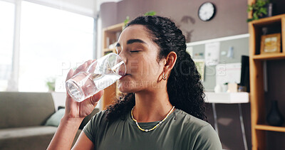 Buy stock photo Woman, drinking and water with glass in home for hydration, thirst or natural sustainability. Female person, relax and mineral liquid with cool beverage for fitness break, rest or recovery in house