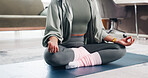 Hands, woman and meditation for yoga at house for fitness, spiritual healing and holistic balance. Person, lotus pose and yogi exercise for peace, mindfulness practice and self awareness for wellness