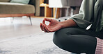 Hands, person and meditation for yoga at house for fitness, spiritual healing and holistic balance. Woman, lotus pose and yogi exercise for peace, mindfulness practice and self awareness for wellness