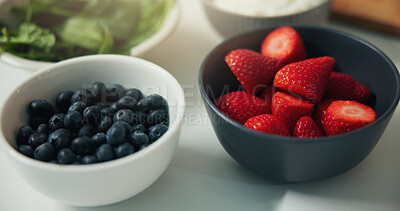 Buy stock photo Strawberries, blueberries and bowl with fruit for diet, nutrition or natural organic meal prep. Closeup, vitamins and ingredients with fiber for healthy breakfast, vegetarian food or recipe in home