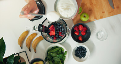 Buy stock photo Yogurt, blender and hands of person with smoothie in kitchen for health, wellness or breakfast. Dairy, nutrition and top view of fruit for vitamins, organic or protein shake for diet in house