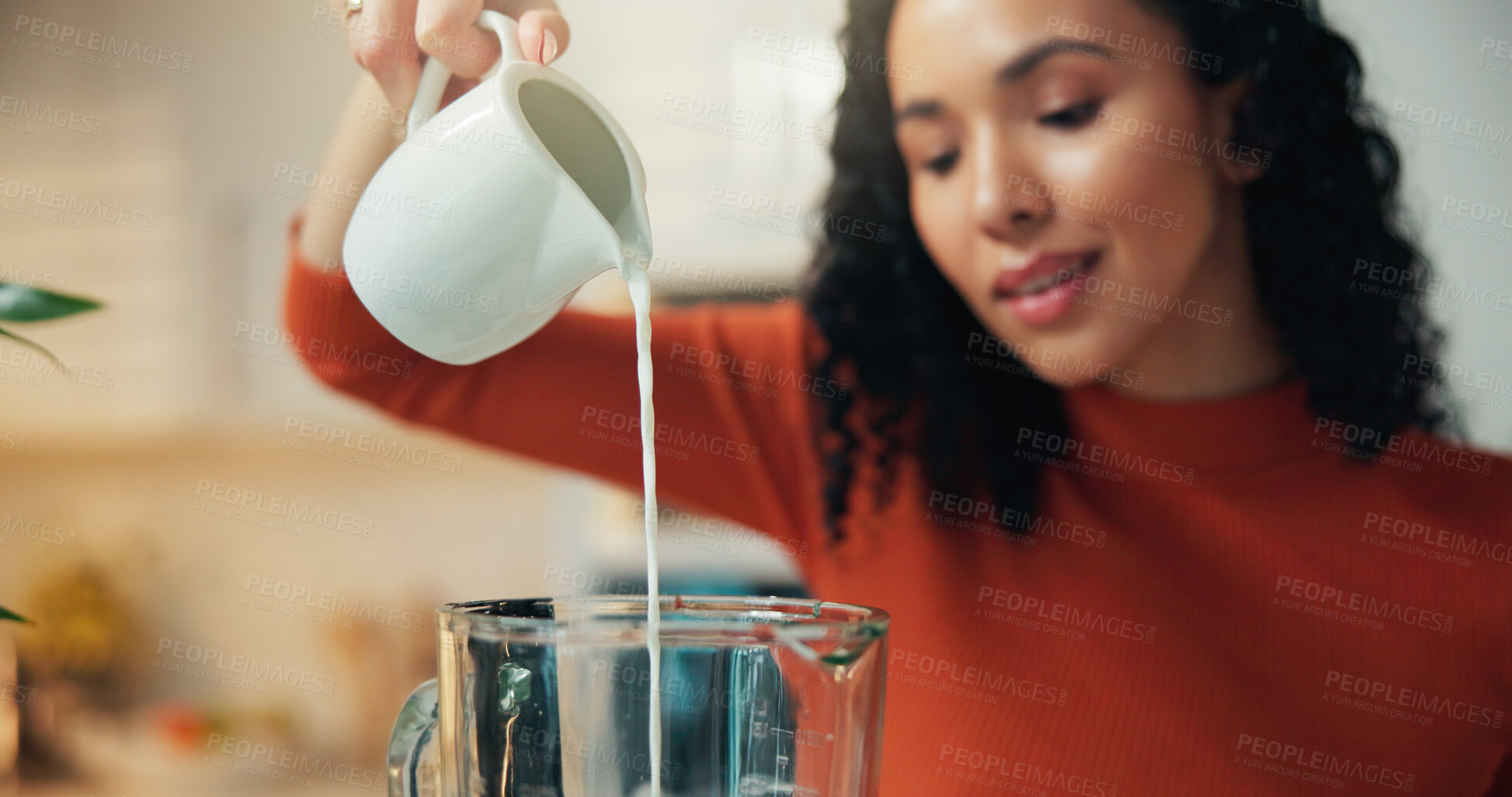 Buy stock photo Hands, blender and pour milk in kitchen for healthy drink, diet and supplement for detox at home. Person, machine and dairy product for benefits, nutrition and gut health with wellness at apartment