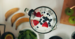 Blender, fruit or milk with diet for smoothie, nutrition or health recipe above in kitchen. Top view, strawberries or blueberries with mix for natural organic drink, protein shake or vitamins in home