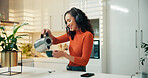 Coffee, happy and woman in kitchen with headphones for streaming song, audio and podcast. Home, relax and person with kettle for drink and listening to radio, music or online subscription on weekend