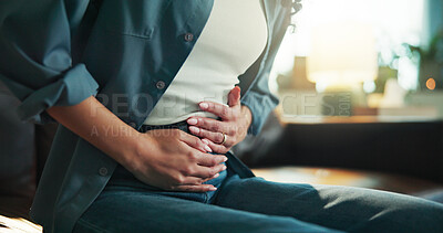 Buy stock photo Hands, cramps or sick woman with stomach pain in home for tummy ache or menstruation issue. Period, uncomfortable or ill female person with sore abdomen with pms, menstrual discomfort or digestion