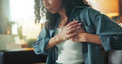 Buy stock photo Heart attack, emergency and fear with woman on sofa for chest pain, angina and medical crisis. Cardiac arrest, hypertension and anxiety with person in living room of home for  heartburn and risk