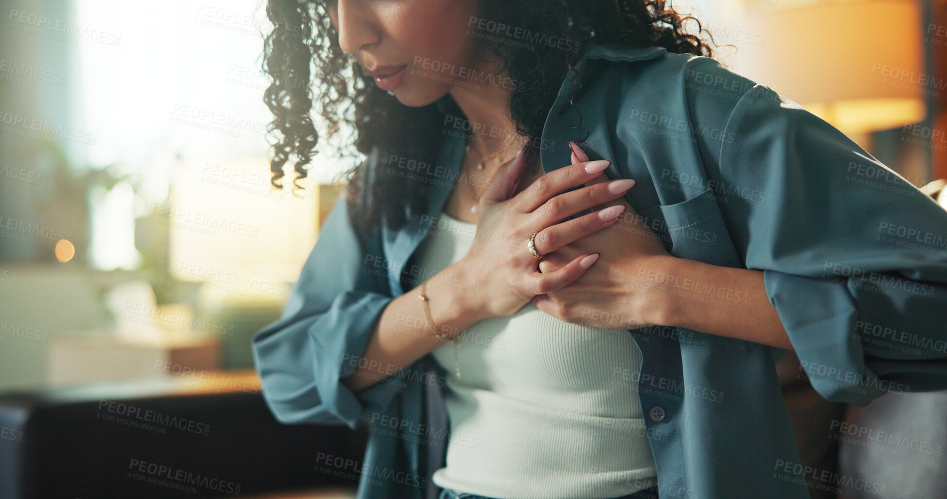Buy stock photo Heart attack, emergency and fear with woman on sofa for chest pain, angina and medical crisis. Cardiac arrest, hypertension and anxiety with person in living room of home for  heartburn and risk