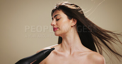 Buy stock photo Beauty, hair care and woman with hairdryer on studio background for styling, drying and heat. Mockup space, person or cosmetics appliance for keratin treatment, selfcare routine or growth maintenance