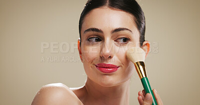 Buy stock photo Powder, makeup and brush with woman in studio for blush, cosmetics and foundation application. Contour tools, beauty and cosmetology with person on background for glow, self care and shine space