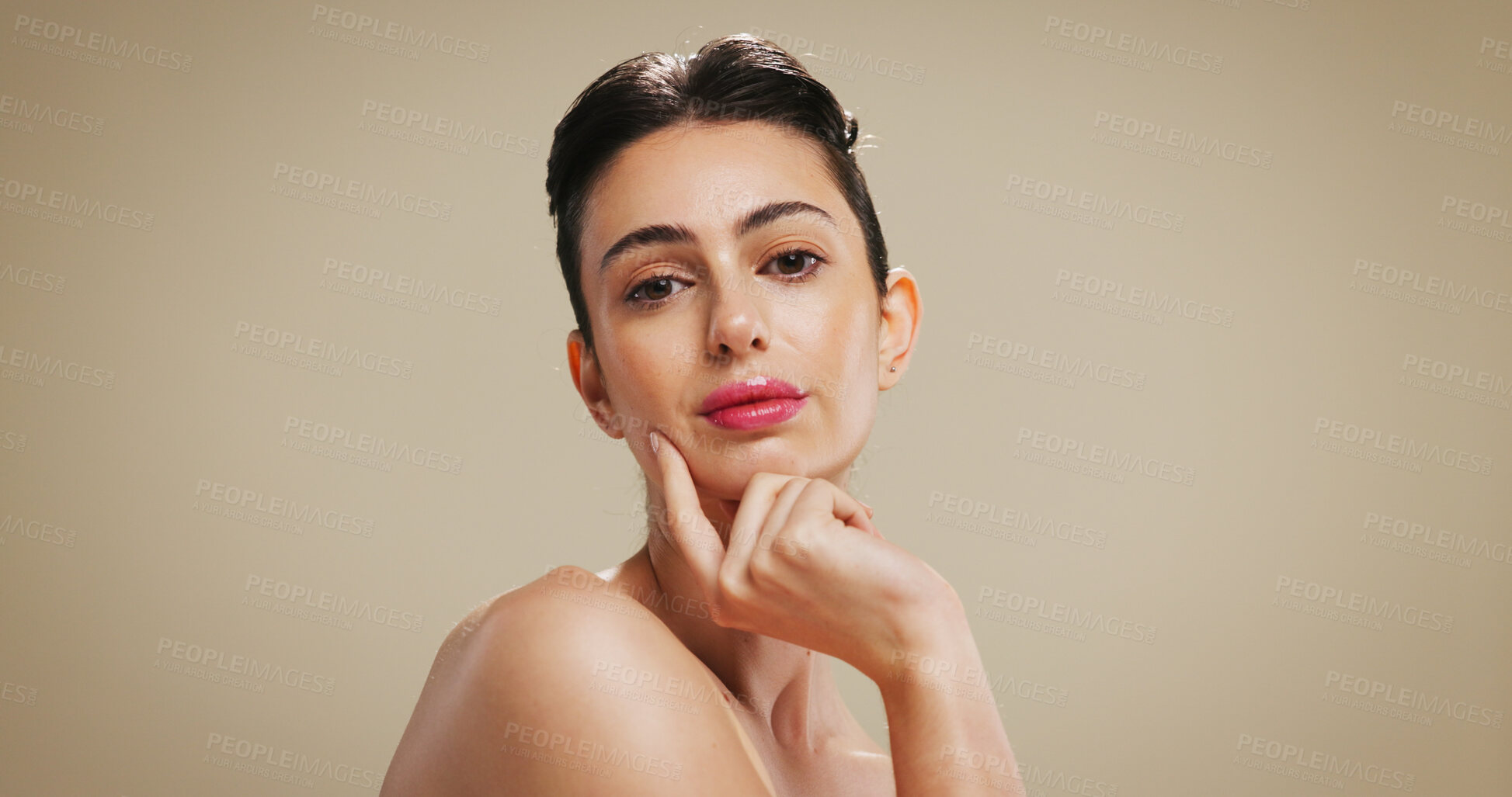 Buy stock photo Portrait, makeup and woman in studio for aesthetic, skincare or beauty with health. Serious face, cosmetics and confident model with lipstick, wellness or facial treatment on brown background space
