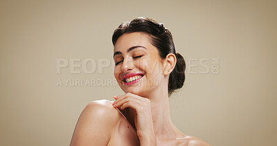 Buy stock photo Thinking, happy and woman for skincare in studio of natural glow, facial treatment and dermatology. Smile, female person and healthy skin with beauty, collagen results and texture on brown background