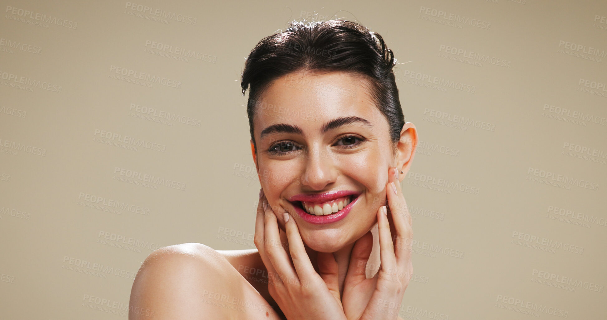 Buy stock photo Portrait, beauty and happy woman in studio with makeup, aesthetic and self care with glow. Face, cosmetics and confident model with lipstick, shine and skincare with space on brown background