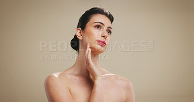Buy stock photo Skincare, touch and thinking with woman on studio background for cosmetic ideas or vision. Beauty, foundation and glow with female model on space for facial results, lipstick color or wellness
