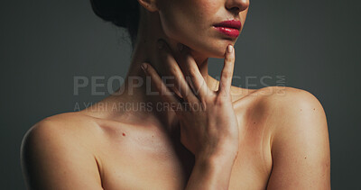 Buy stock photo Cosmetics, red lipstick and shoulders of woman in studio with beauty, self care or makeup. Skincare, cosmetology and female person with natural body glow for dermatology routine by grey background.