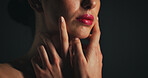 Makeup, red lipstick and face of woman in studio with beauty, self care or cosmetics. Skincare, cosmetology and female person with natural facial glow for dermatology routine by black background.