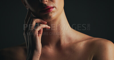 Buy stock photo Shoulder, glow and hand of woman in studio for dermatology, body care and hygiene. Collagen benefits, aesthetic and shine with closeup of person on black background for space, grooming and touch