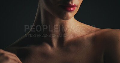 Buy stock photo Shoulder, beauty and skincare with woman in studio for dermatology, body care and hygiene. Collagen benefits, aesthetic and shine with closeup of person on black background for grooming and neck