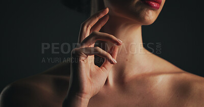 Buy stock photo Shoulder, skincare and hand of woman in studio for dermatology, body care and hygiene. Collagen benefits, aesthetic and shine with closeup of person on black background for space, grooming and touch