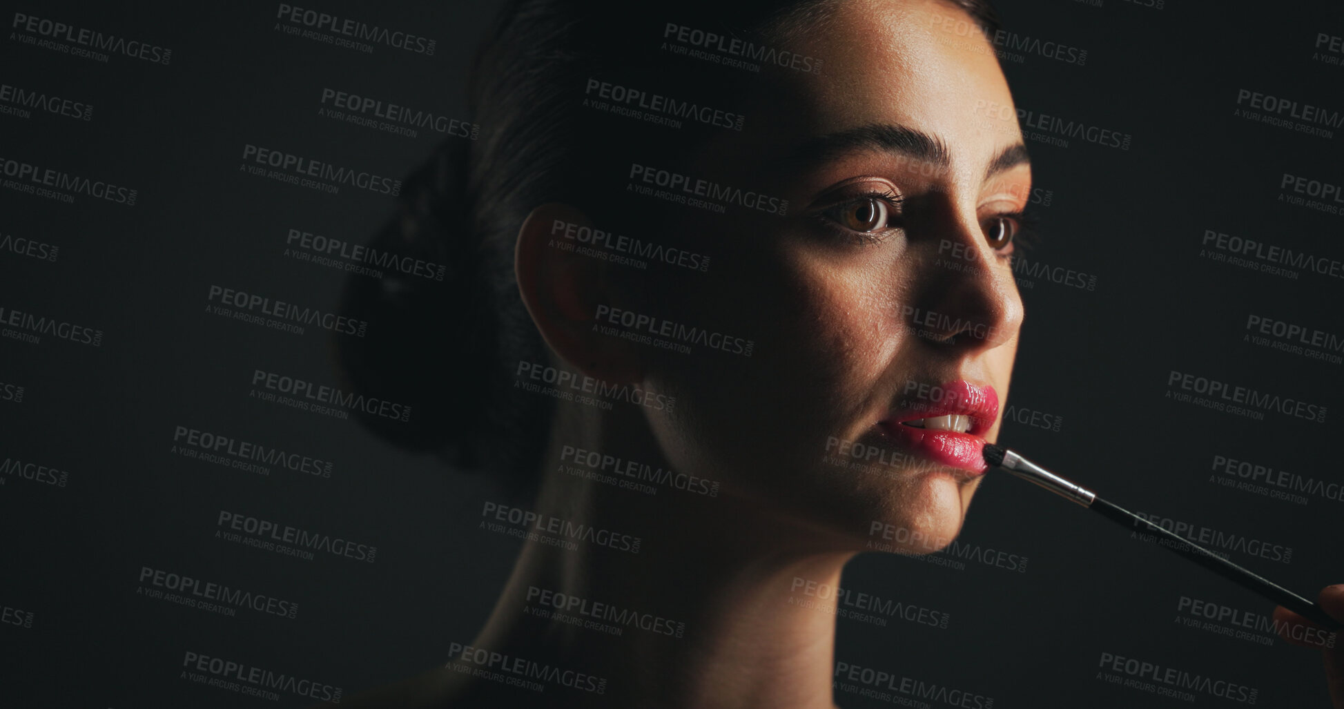 Buy stock photo Makeup, brush and woman in studio with lipstick, beauty or facial routine with products. Cosmetics, self care and female person with tool for face cosmetology treatment for glow on black background