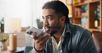 Buy stock photo Phone call, home and man on sofa, loudspeaker and connection with communication. Conversation, cellphone and person with audio chat, recording and message with voice note and app for translation