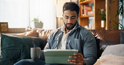 Buy stock photo Remote work, man and coffee with tablet in home for small business development, research or report. Freelance entrepreneur, person and digital app on sofa for startup planning and reading proposal