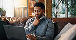 Freelancer, laptop and thinking with man on sofa for article research, blog writer and reflection. Journalist planning, remote worker and draft editing with person in living room of home for idea