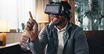 Virtual reality, pointing and man on sofa in home for online gaming, metaverse or connection. Happy, living room and person with vr headset for futuristic user experience, simulation or entertainment