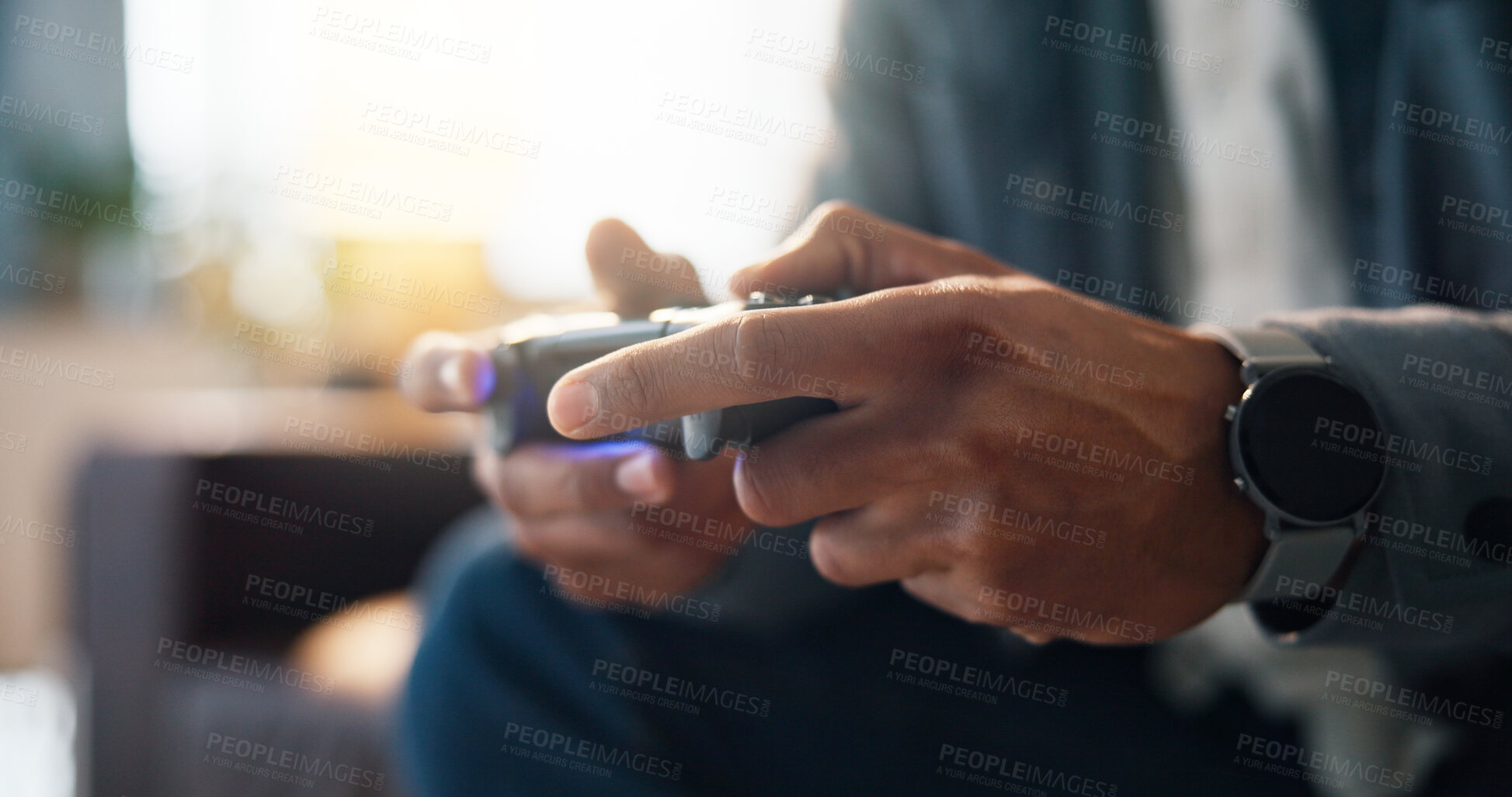 Buy stock photo Hands, man and playing games with controller on sofa for gaming challenge, online contest or esports. Gamer, player and joystick light in house for entertainment, arcade competition and subscription