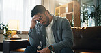 Home, headache and man on sofa, stress and tired with pain, burnout and frustrated in living room. Apartment, mental health or person on couch, migraine and exhausted with anxiety, worry or brain fog