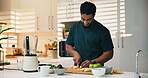 Blender, fruit and man with smoothie in kitchen for healthy diet, nutrition and wellness. Home, detox and person with protein shake, drink and ingredients for vitamins, supplements and benefits