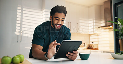 Buy stock photo Tablet, happy and man with coffee in kitchen in morning with networking, communication or app. Technology, research and male person with cappuccino for texting, contact or social media in apartment.