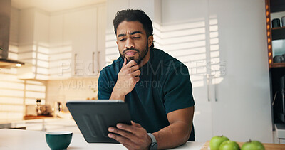Buy stock photo Tablet, thinking and man with coffee in kitchen in morning with networking, communication or app. Technology, research and person with cappuccino for texting, contact or social media in apartment.