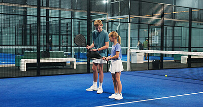 Buy stock photo Padel, learning and children with racket on court for sports workout, exercise and training together. Fitness club, siblings and boy with girl for playing game, match and tournament for practice